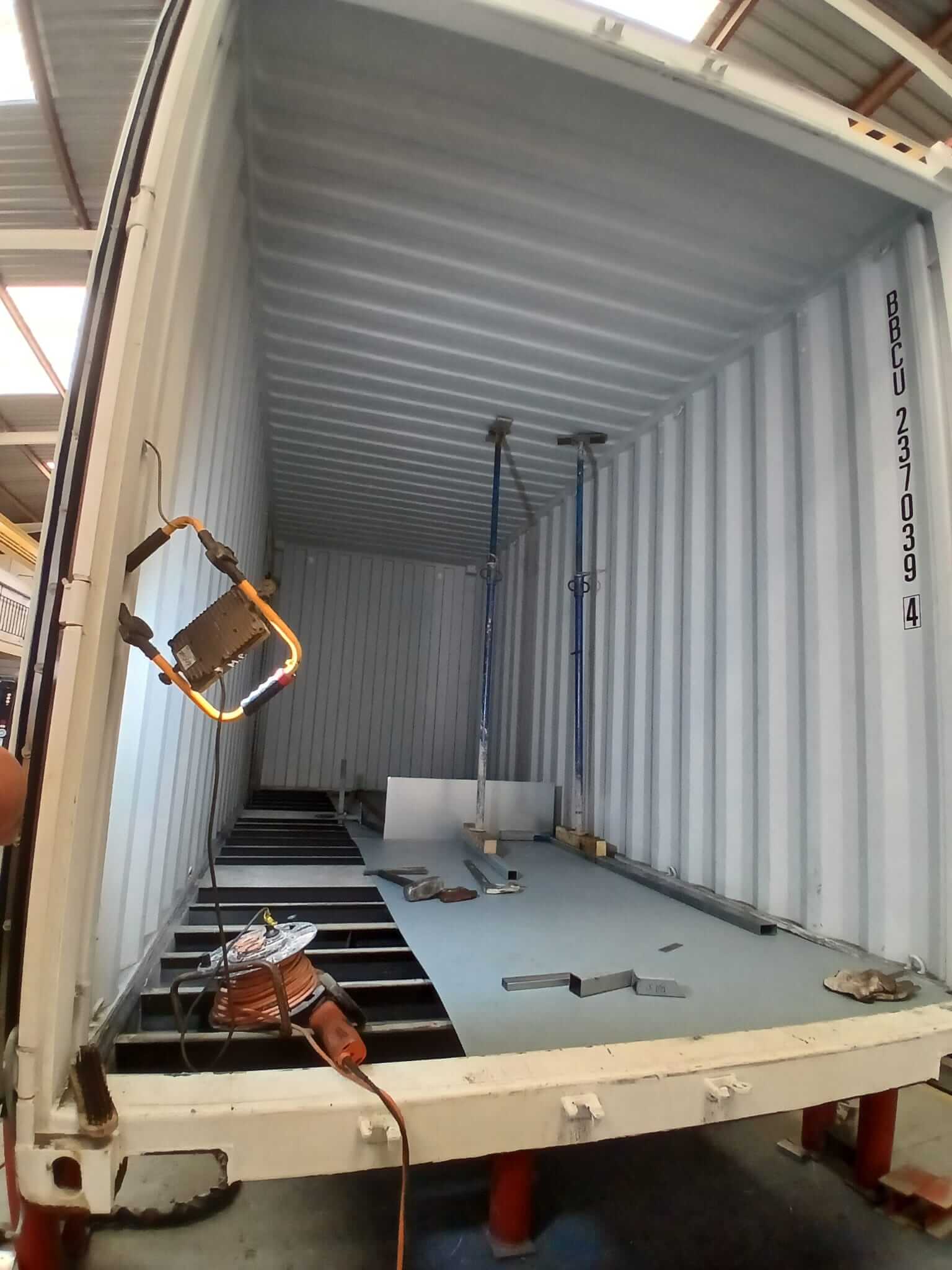 1_ContainerInterior_beginning Interior of the POSEIDON container at the start of the adaptation works, with the floor under modification.