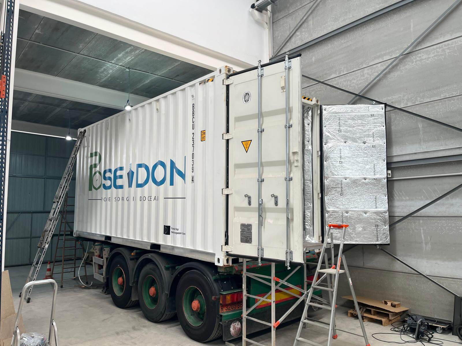 7_ContainerExterior Exterior of the customised POSEIDON energy storage container with project branding and EU funding acknowledgement.